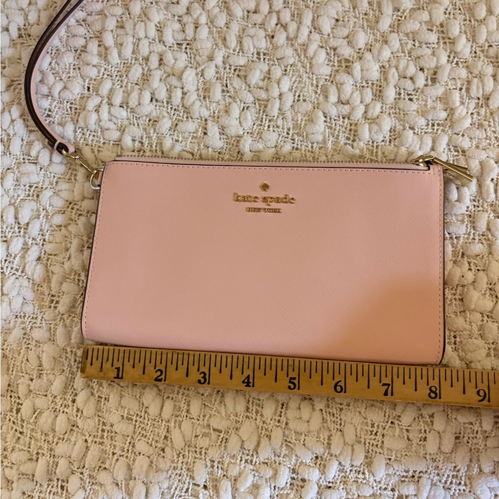 Kate Spade wristlet. Light pink. Leather.